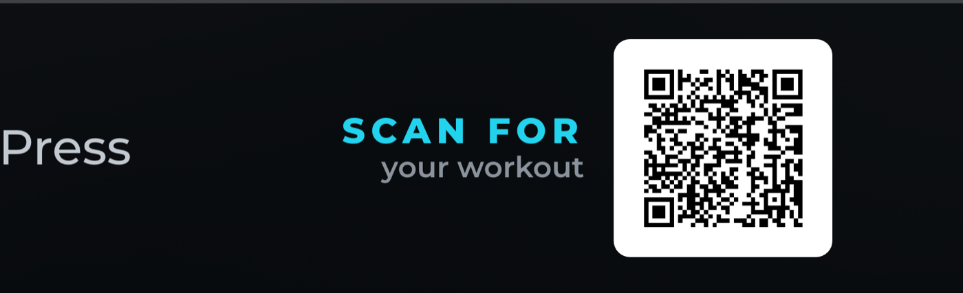 Close-up of the SCAN FOR your workout code in the corner of the class board