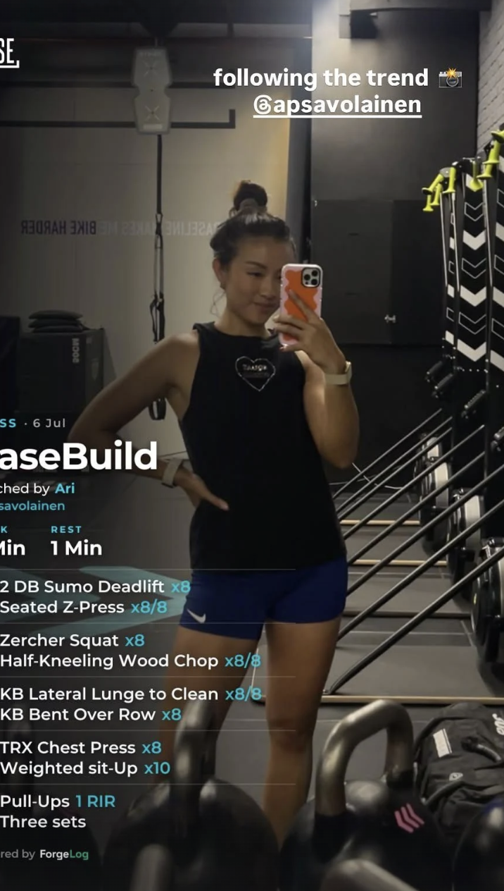 A real posted story: a BaseBuild class card over a client's own gym photo
