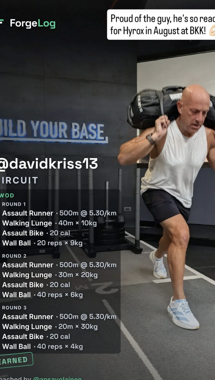A real posted story from a personal-training session: a three-round circuit card over a photo of the client carrying a sandbag